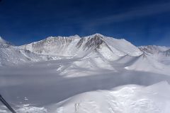 07B Flying By Branscomb Glacier, Branscomb Peak, Mount Vinson, Silverstein Peak, Opalchenie Peak, Brichebor Peak, Mount Rutford, Mount Craddock Just Before Landing At Mount Vinson Base Camp.jpg